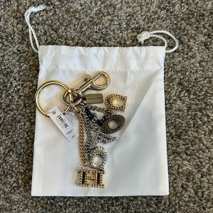 Gold with bits of silver coach chain linked letters multi mix key ring bag charm
